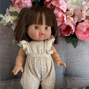 Minikane Brown-Haired Doll in Cream Outfit